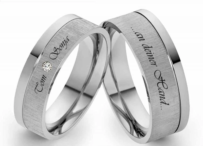 Edelstahlringe E132 mit Zirkonia oder Diamant und Außengravur