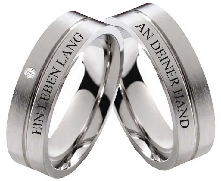 Edelstahlringe E291 mit Zirkonia oder Diamant und Außengravur
