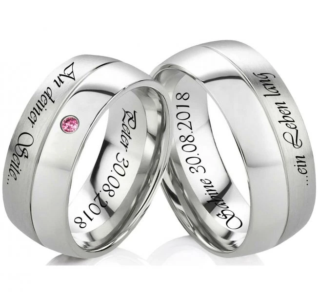 Traumhaft Edelstahlringe E971 mit Zirkonia Raspberry und Außengravur