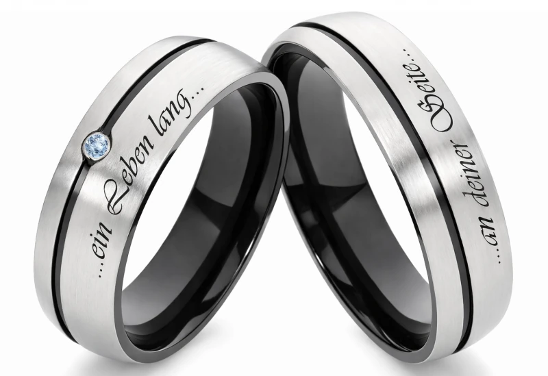 Titanringe schwarz T133 mit Zirkonia blau