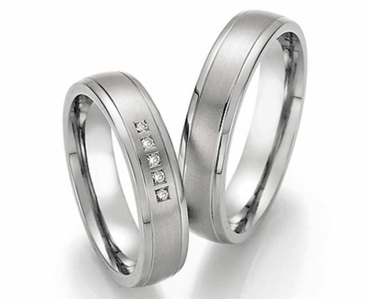 Trauringe aus Titan 77/20010-050+77/20020-050 mit Diamanten Trauringe aus Titan 77/20010-050+77/20020-050 mit Diamanten