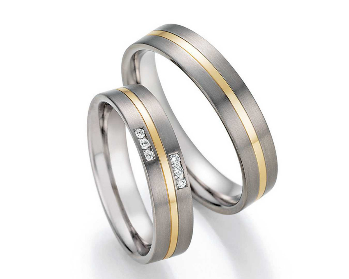 Trauringe aus Titan 78-10050+78-10060 mit Diamanten und Gelbgoldeinlage Trauringe aus Titan 78-10050+78-10060 mit Diamanten und Gelbgoldeinlage