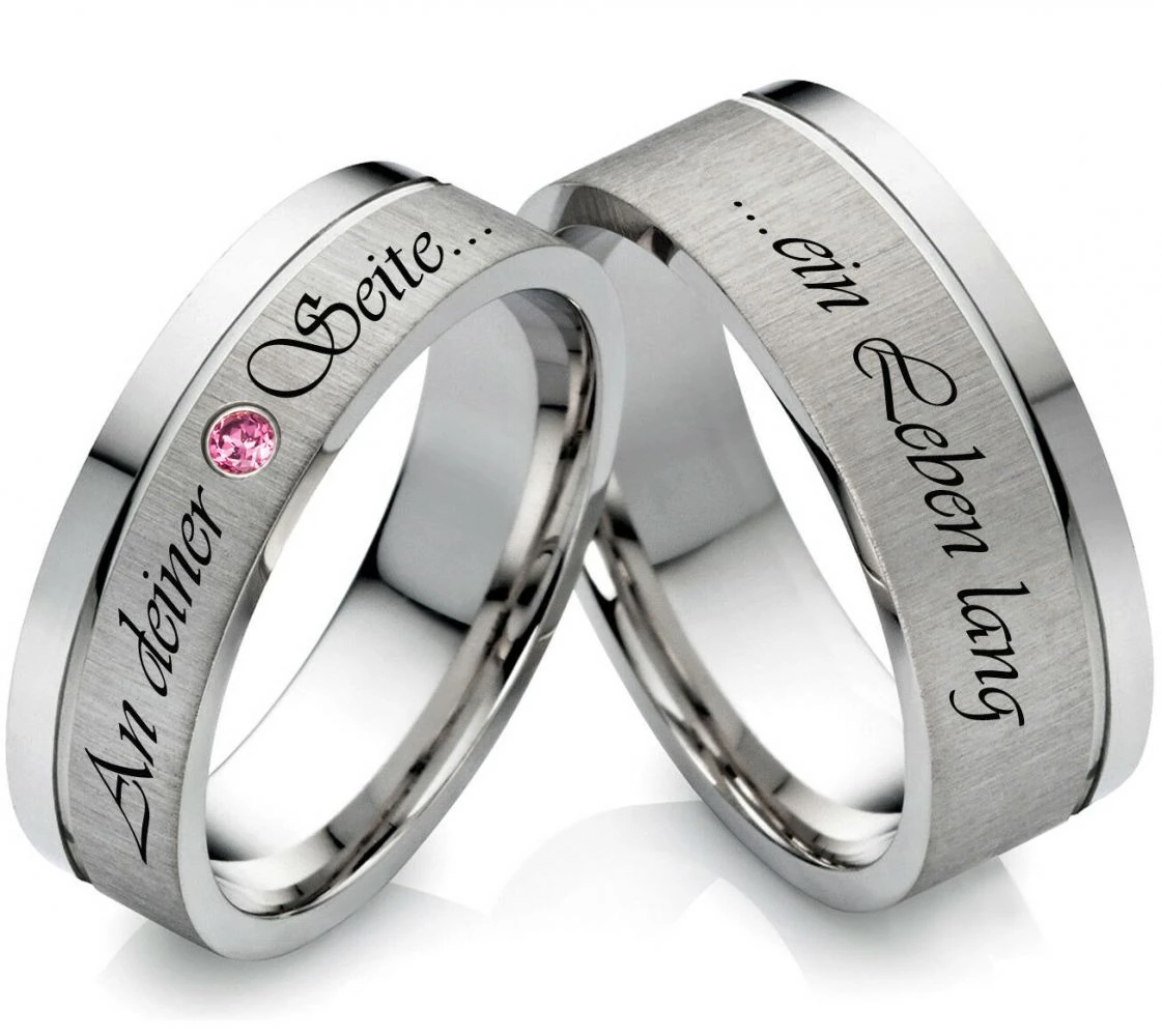 Edelstahlringe Z123 mit Zirkonia Rot und Außengravur