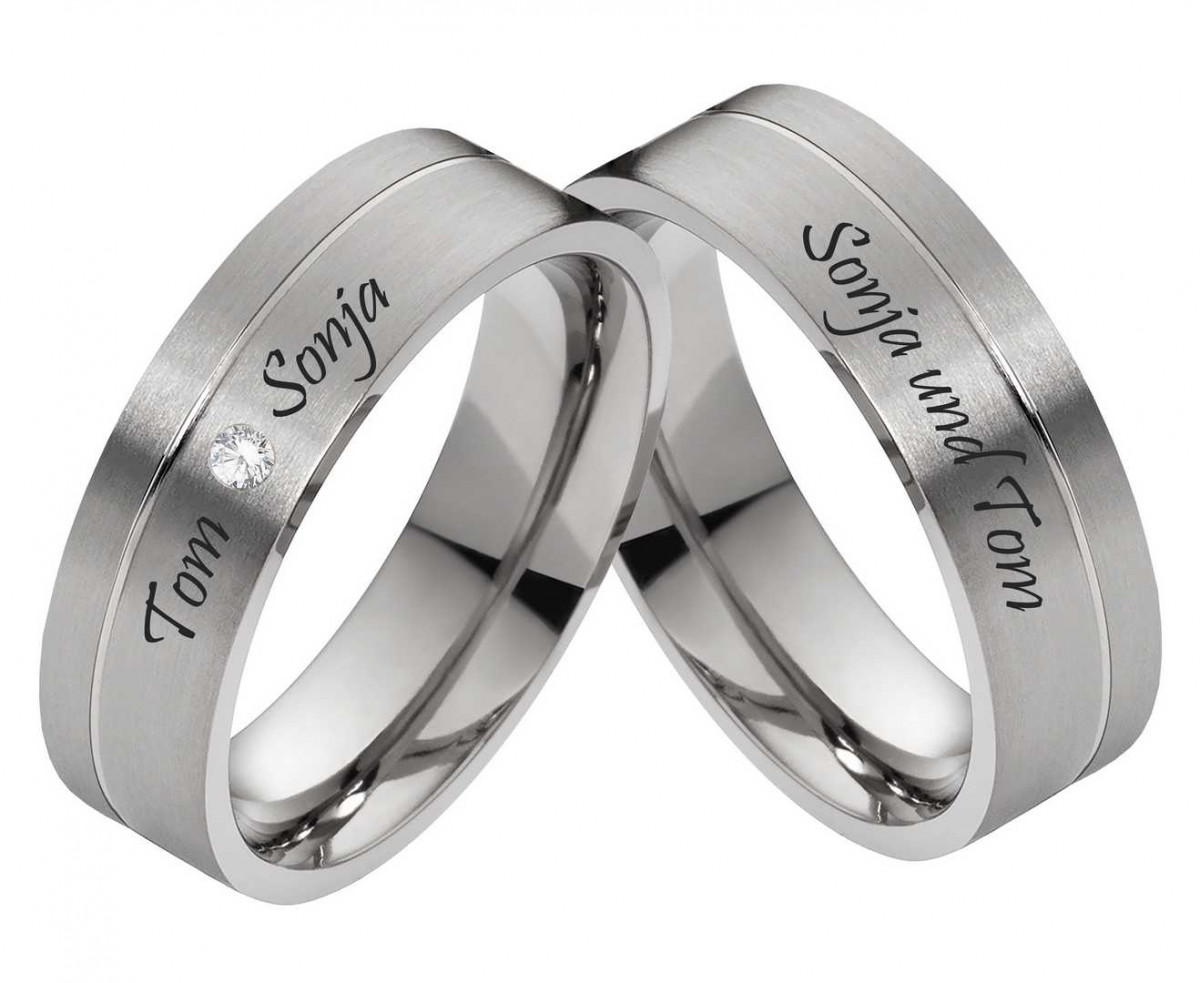 Titanringe T073 mit Zirkonia und Außengravur Titanringe T073 mit Zirkonia und Außengravur